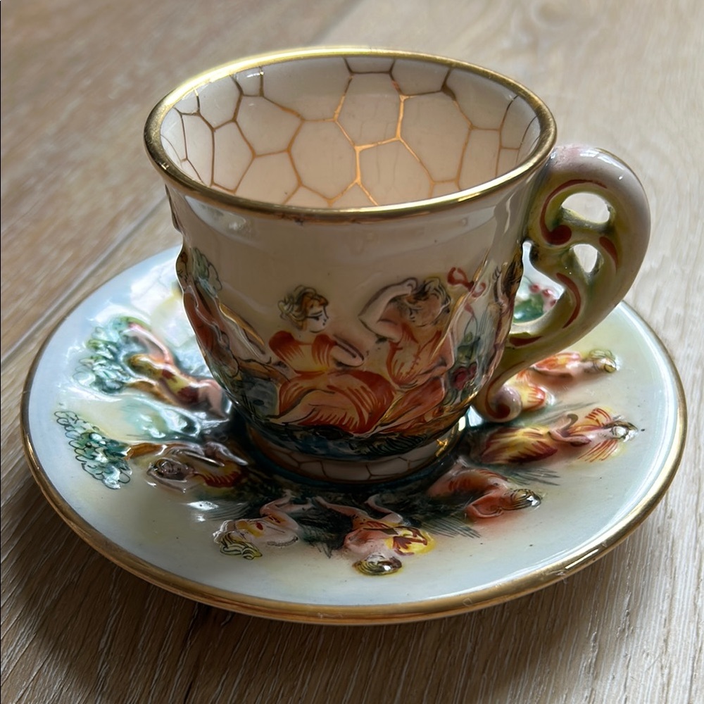 CAPODIMONTE tea cup and saucer cherubs & Mermaids teacup Italy 1930s
